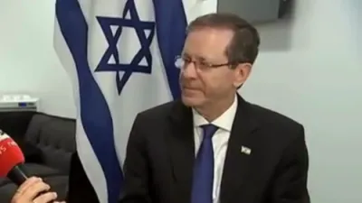 Israeli President Herzog Challenges Protesters to Target Iran.