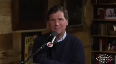 Tucker Carlson Questions Huckabee Over Airport Dispute.