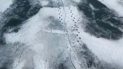 Drone Footage Reveals Cracking Ice Across Lake Erie.