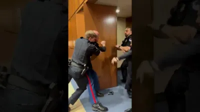 Republican Sen. Sheehy Physically Removes Disruptive Protester.