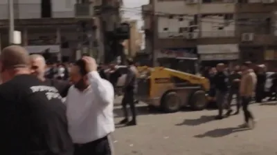 Iran Missile Strike Hits Central Israel, Injuring Two.