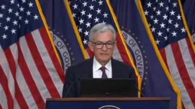 Powell Announces Fed Holds Interest Rates Steady Amid Uncertainty.