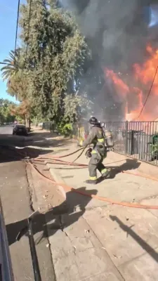 Firefighters Work Overtime to Contain Victorian House Fire.