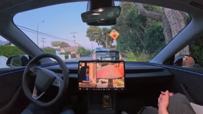Tesla Self-Driving 14.3 Navigates Sunset Strip in Demo Drive.