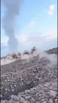 Deadly Close Call: Shocking Footage Shows Hikers Dodging Deadly Rockfall Inside Erupting Volcano Crater.