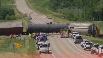 Train Collides With Semi In Eastern Iowa Killing Driver's 14-Year-Old Son.