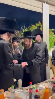 The Sadigura Rebbe Shlit"a Attends a Sheva Brachos