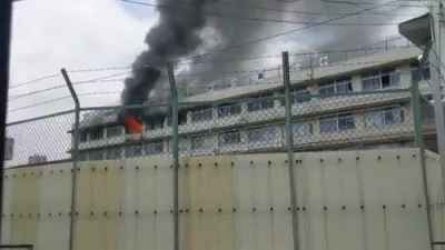 Dramatic Tokyo Elementary School Inferno: Children Rescued from Roof as Fire Rages.