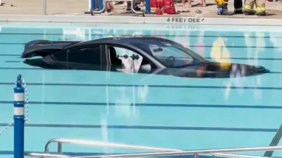 Wild Incident: Driver Loses Control of Tesla, Crashes Through Fence Straight into Pool.