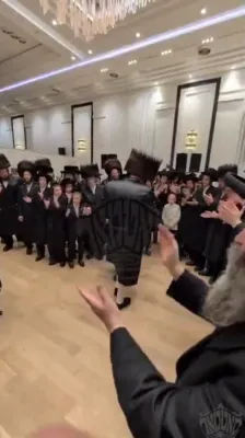 Satmar Rebbe Shlit"a at Wedding of R' Moshe Eliyahu Ostreicher HY"V, CEO of Kiryas Joel Mosdos. The Rebbe drank L'chaim, recited Sheva Brachos, and danced Rikudei Mitzvah before the Kallah in Ateres Malka Hall. Also seen...