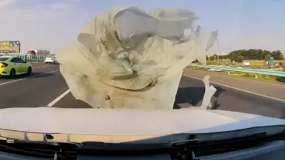 Driver Goes Completely Blind on Highway After Tarp Slams Windshield.
