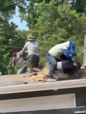 Wild Video: Roofers Tumble Off Roof Mid-Fight and Continue Brawling on the Ground.