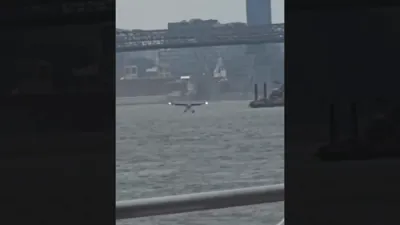 On-Camera Chaos: Small Plane Crash-Lands in East River, FDNY Pulls 10 to Safety.