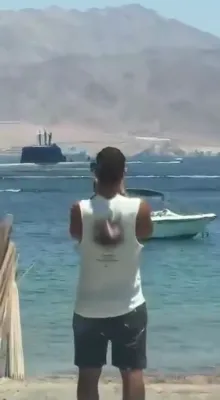 Stunning Footage: Israeli Submarine Rises Right Off Eilat Coast in Front of Swimmers.