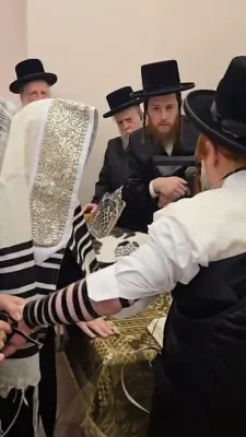 The Skverer Rebbe Shlit"a at the Tefillin Laygen for the son of R' Chaim Green