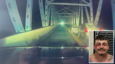 Crazy Moment: Driver Abandons Car and Leaps Off Bridge to Flee Missouri Police.