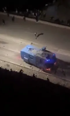 Chaos on the Border: Migrants Set Vehicles Ablaze in Fight to Reach Spain.