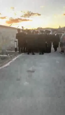 The Toldos Aharon Rebbe Shlit"a wishing Hagaon Hechasid R' Yosef Chaim Greenwald Shlit"a "gepoilt alles guts" after the Hisorerus Rachamim gathering at the tziyon in Liska