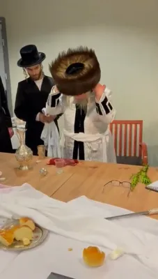 Video of the Kretchnif Sighet Rebbe Z"L with the segulah of the shiyurei hayayin from Havdalah.