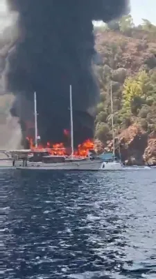Boat Fire Forces 115 Tourists to Jump Ship in Turkey Bay.