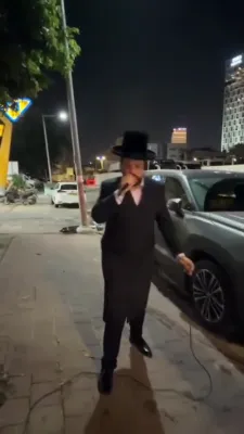 Singer Motty Vizel Surprises the Crowd Outside the Hall Together With Srulik Stern Before Going Into a Farbrengen
