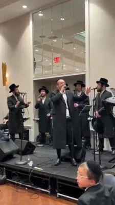 R' Ahrele Samet at a Chasunah with Meir Adler and the Malchus Choir.