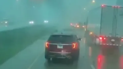 Dashcam Captures Terrifying Drive Through Illinois Storm's 70 MPH Wind Gusts.