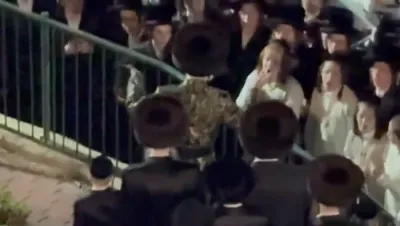 Motzaei Yom Kippur in Seret Vizhnitz: Chassidim Escort the Rebbe with Song After the Tish