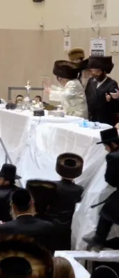 The Vizhnitzer Rebbe Shlit"a in a Fiery Dance at the Neilas Hachag Tish