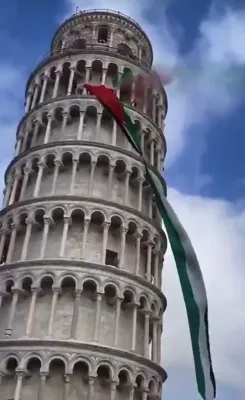 LEANING TOWER, SMOKE FLARES: Fifteen Students Breach Security To Raise Palestinian Flag