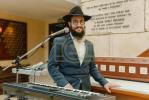 מעמד סיום כתיבת ספר תורה אין מאסקאווא וואס איז אריינגעגעבן געווארן צו די קהילה אין שטאט  נובוקוזנצק אין סיביר