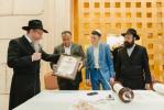 מעמד סיום כתיבת ספר תורה אין מאסקאווא וואס איז אריינגעגעבן געווארן צו די קהילה אין שטאט  נובוקוזנצק אין סיביר