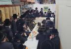 קביעת מזוזה אין די אפיסעס פון די יחד ארגאניזאציע 
