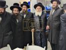קביעת מזוזה אין די אפיסעס פון די יחד ארגאניזאציע 