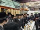 קביעת מזוזה אין די אפיסעס פון די יחד ארגאניזאציע 