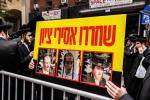  עצרת מחאה מאסן פיקטיניג בחוצות מאנהעטען אקעגן איבער די קאנסול פון די ציונים וואס איז פארופן געווארן דורך כ"ק אדמו"ר מסאטמאר שליט"א
