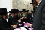 בילדער פונעם "סעודת הילולא רבתי" אינאיינעם מיט'ן מעמד "הננו" לטובת המוסדות בראשות כ"ק גאב"ד סאטמאר מאנסי שליט"א