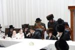 מעמד הנחת תפילין און לחיים פאר א אייניקל פון האדמו"רים ממאדזיץ און סערט וויזניץ