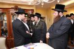 מעמד חתימת שטרת לרגל קניית זכות בית המדרש "בית בן ציון" במחנה אהל ברוך קראסנא