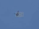 א מדינת ישראל'דיגע "אפאטשי" העליקאפטער (AH-64) בשעת'ן דורכפירן אקציעס קעגן כאמאס צילן אינעם מערב זייט פון עזה סיטי.