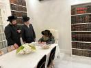 כ"ק אדמו"ר מסאטמאר שליט"א אין מאנטריאל ביי חתימות שטרות ביי הרבני הנכבד ר' ברוך אבערלענדער הי"ו