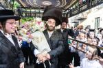 חגיגת הכנסת ספר תורה  להיכל ישיבת עסק התורה  ע"י הרבני הנגיד הרה"ח רבי יואל פליישמאן שליט"א פטרון הישיבה ונדבן הספר  בהשתתפות אדמור"י ורבני העיר שליט"א, מרביצי תורה ותלמידי הישיבה