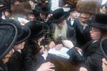 חגיגת הכנסת ספר תורה  להיכל ישיבת עסק התורה  ע"י הרבני הנגיד הרה"ח רבי יואל פליישמאן שליט"א פטרון הישיבה ונדבן הספר  בהשתתפות אדמור"י ורבני העיר שליט"א, מרביצי תורה ותלמידי הישיבה