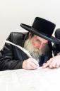 חגיגת הכנסת ספר תורה  להיכל ישיבת עסק התורה  ע"י הרבני הנגיד הרה"ח רבי יואל פליישמאן שליט"א פטרון הישיבה ונדבן הספר  בהשתתפות אדמור"י ורבני העיר שליט"א, מרביצי תורה ותלמידי הישיבה