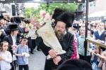 חגיגת הכנסת ספר תורה  להיכל ישיבת עסק התורה  ע"י הרבני הנגיד הרה"ח רבי יואל פליישמאן שליט"א פטרון הישיבה ונדבן הספר  בהשתתפות אדמור"י ורבני העיר שליט"א, מרביצי תורה ותלמידי הישיבה