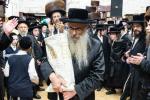 חגיגת הכנסת ספר תורה  להיכל ישיבת עסק התורה  ע"י הרבני הנגיד הרה"ח רבי יואל פליישמאן שליט"א פטרון הישיבה ונדבן הספר  בהשתתפות אדמור"י ורבני העיר שליט"א, מרביצי תורה ותלמידי הישיבה