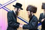 חגיגת הכנסת ספר תורה  להיכל ישיבת עסק התורה  ע"י הרבני הנגיד הרה"ח רבי יואל פליישמאן שליט"א פטרון הישיבה ונדבן הספר  בהשתתפות אדמור"י ורבני העיר שליט"א, מרביצי תורה ותלמידי הישיבה