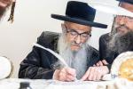 חגיגת הכנסת ספר תורה  להיכל ישיבת עסק התורה  ע"י הרבני הנגיד הרה"ח רבי יואל פליישמאן שליט"א פטרון הישיבה ונדבן הספר  בהשתתפות אדמור"י ורבני העיר שליט"א, מרביצי תורה ותלמידי הישיבה