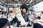 חגיגת הכנסת ספר תורה  להיכל ישיבת עסק התורה  ע"י הרבני הנגיד הרה"ח רבי יואל פליישמאן שליט"א פטרון הישיבה ונדבן הספר  בהשתתפות אדמור"י ורבני העיר שליט"א, מרביצי תורה ותלמידי הישיבה