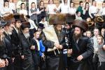 חגיגת הכנסת ספר תורה  להיכל ישיבת עסק התורה  ע"י הרבני הנגיד הרה"ח רבי יואל פליישמאן שליט"א פטרון הישיבה ונדבן הספר  בהשתתפות אדמור"י ורבני העיר שליט"א, מרביצי תורה ותלמידי הישיבה